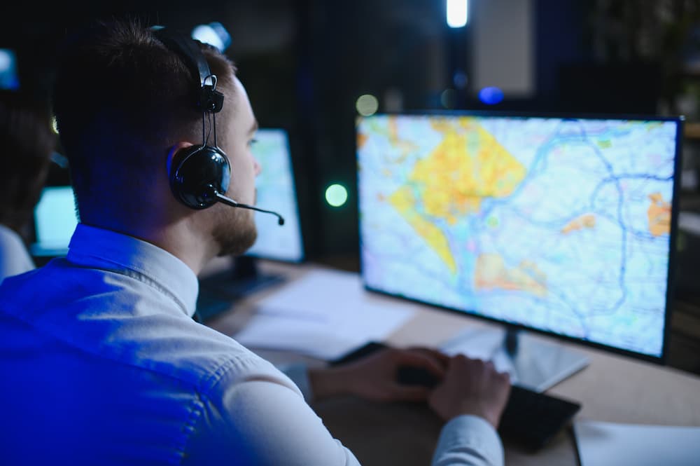 team member tracking cargo on map